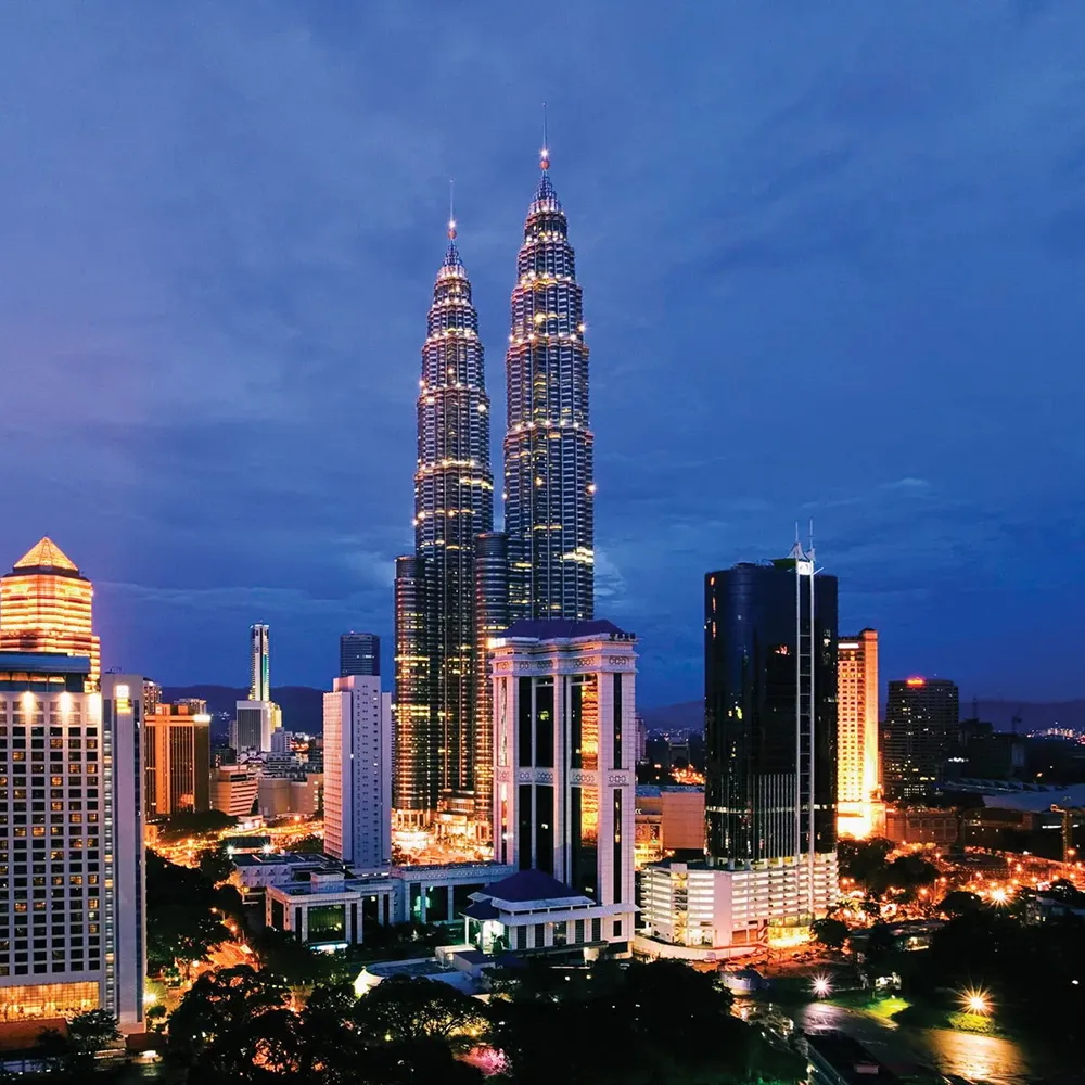 petronas towers kuala lumpur nightscape highlight of malaysia tour packages from bangladesh